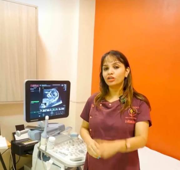 Dr. Archana Mohana performing ultrasound scan – expert lady gynecologist in Indore